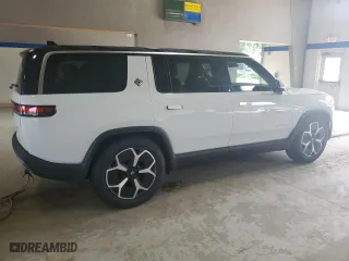 2023 Rivian R1S Adventure with VIN 7PDSGABAXPN021962, listed as a Copart auction lot 66184454 with 0 mi miles and Salvage Title. Bid and sale history available at carsss.com. Image 3.