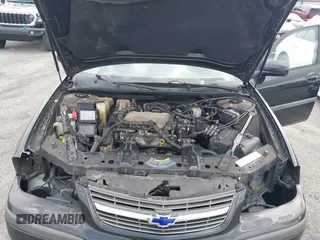 2004 Chevrolet Impala with VIN 2G1WF52E349136173, listed as a IAAI auction lot 42149870 with 165,215 mi miles. Bid and sale history available at carsss.com. Image 10.