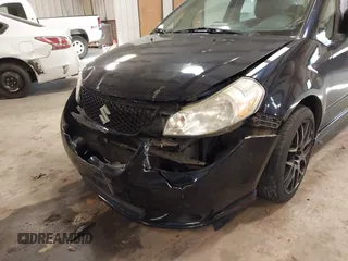 2008 Suzuki SX4 Convenience Pkg with VIN JS2YC415285110418, listed as a IAAI auction lot 41409562 with 147,175 mi miles. Bid and sale history available at carsss.com. Image 6.
