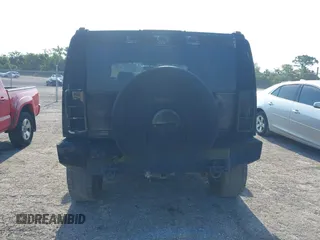 2003 Hummer H2 z VIN 5GRGN23UX3H140510, wystawiony jako IAAI lot #42325527 z przebiegiem 140 010 mil mil oraz . Historia ofert i sprzedaży dostępna na DreamBid. Obrazek 17.