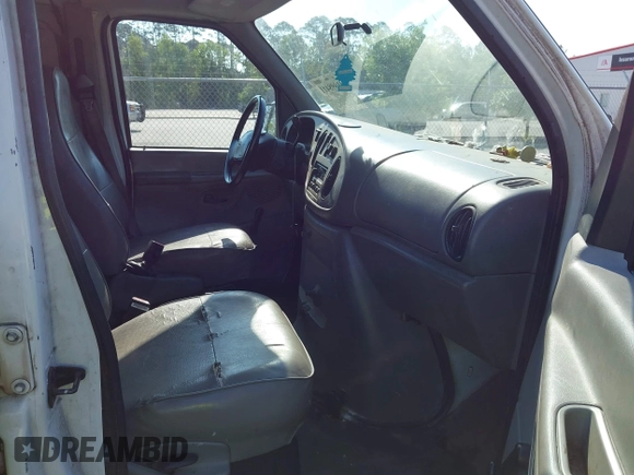 1999 Ford Econoline Cargo with VIN 1FTRE1420XHA34056, listed as a IAAI auction lot 41998411 with 236,267 mi miles. Bid and sale history available at carsss.com. Image 5.