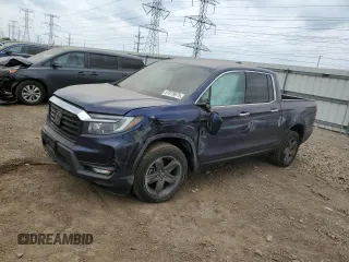 2023 Honda Ridgeline RTL-E with VIN 5FPYK3F75PB037373, listed as a Copart auction lot 57018875 with 36,671 mi miles and Salvage title. Bid and sale history available at DreamBid. Image 1.