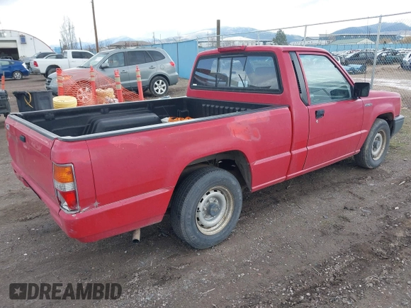 1994 Mitsubishi Mighty Max z VIN JA7LS21G0RP007773, wystawiony jako IAAI lot #41915117 z przebiegiem 68 410 mil mil oraz . Historia ofert i sprzedaży dostępna na DreamBid. Obrazek 4.