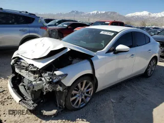 2020 Mazda 3 Select z VIN 3MZBPBCM2LM129287, wystawiony jako Copart lot #50370165 z przebiegiem 102 295 mil mil oraz Szkoda całkowita • Salvage title. Historia ofert i sprzedaży dostępna na DreamBid. Obrazek 1.