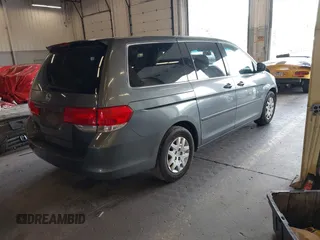 2008 Honda Odyssey LX with VIN 5FNRL38258B064490, listed as a IAAI auction lot 42228533 with 126,043 mi miles and . Bid and sale history available at DreamBid. Image 4.