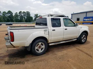 2001 Nissan Frontier SE z VIN 1N6ED27T21C305986, wystawiony jako Copart lot #59665065 z przebiegiem 201 540 mil mil oraz Czysty tytuł • Clean title. Historia ofert i sprzedaży dostępna na DreamBid. Obrazek 3.
