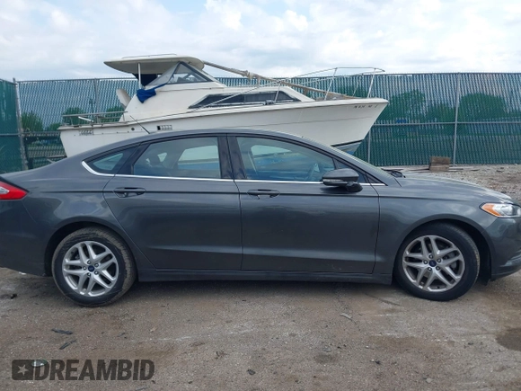 2016 Ford Fusion SE with VIN 3FA6P0H78GR164748, listed as a IAAI auction lot 42209658 with 102,927 mi miles and . Bid and sale history available at DreamBid. Image 13.