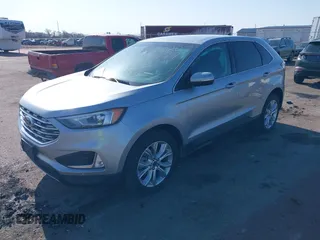 2022 Ford Edge Titanium z VIN 2FMPK4K95NBA33637, wystawiony jako IAAI lot #42074777 z przebiegiem 58 733 mil mil oraz . Historia ofert i sprzedaży dostępna na DreamBid. Obrazek 18.