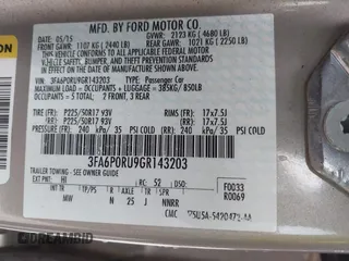 2016 Ford Fusion Titanium Hybrid with VIN 3FA6P0RU9GR143203, listed as a IAAI auction lot 41332144 with 94,357 mi miles. Bid and sale history available at carsss.com. Image 9.