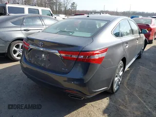 2015 Toyota Avalon Limited with VIN 4T1BK1EB5FU157586, listed as a IAAI auction lot 41827250 with 62,572 mi miles and . Bid and sale history available at carsss.com. Image 4.