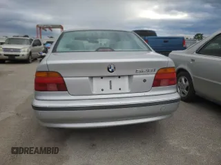 1999 BMW 5 Series 528iA with VIN WBADM6332XBY30585, listed as a Copart auction lot 74830704 with 0 mi miles and Salvage Title. Bid and sale history available at carsss.com. Image 6.