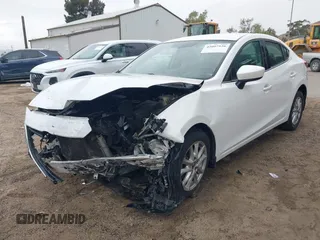2015 Mazda 3 i Touring with VIN 3MZBM1V70FM231234, listed as a IAAI auction lot 42007526 with 114,255 mi miles. Bid and sale history available at carsss.com. Image 2.