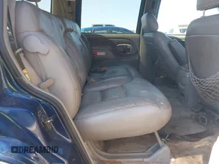 1999 GMC Yukon with VIN 1GKEK13R2XJ708582, listed as a IAAI auction lot 41698586 with 252,630 mi miles. Bid and sale history available at carsss.com. Image 8.