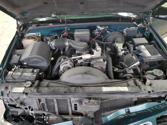 1998 GMC Yukon with VIN 1GKEC13RXWJ731667, listed as a Copart auction lot 78848954 with 202,164 mi miles and Salvage Title. Bid and sale history available at carsss.com. Image 12.