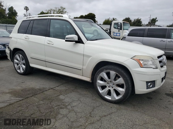 2011 Mercedes-Benz GLK 350 with VIN WDCGG5GB8BF561250, listed as a Copart auction lot 54387585 with 141,182 mi miles and Salvage Title. Bid and sale history available at DreamBid. Image 4.