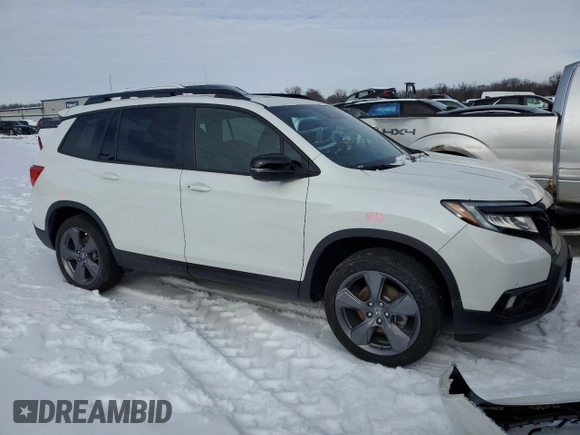 2021 Honda Passport Touring with VIN 5FNYF8H90MB035860, listed as a Copart auction lot 87910965 with 19,316 mi miles and Salvage Title. Bid and sale history available at carsss.com. Image 4.