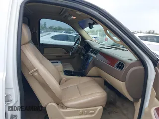 2009 GMC Yukon SLT w/4SA with VIN 1GKFK33049R153415, listed as a IAAI auction lot 41896770 with 182,256 mi miles. Bid and sale history available at carsss.com. Image 5.