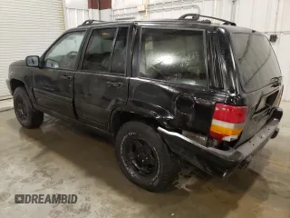 1997 Jeep Grand Cherokee Laredo с VIN 1J4GZ58S3VC508180, выставлен на аукционе Copart как лот 54856525 с пробегом 214 845 миль миль и На запчасти • Non repairable. История ставок и продаж доступна на DreamBid. Изображение 2.