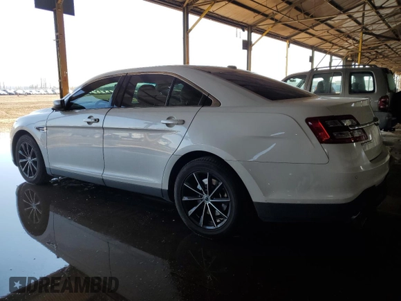 2016 Ford Taurus SEL with VIN 1FAHP2E83GG141760, listed as a Copart auction lot 49679605 with 110,447 mi miles and Salvage Title. Bid and sale history available at DreamBid. Image 2.