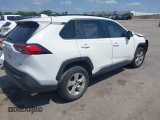 2021 Toyota RAV4 XLE with VIN JTMW1RFV2MD063839, listed as a IAAI auction lot 42406891 with 69,490 mi miles and . Bid and sale history available at DreamBid. Image 4.