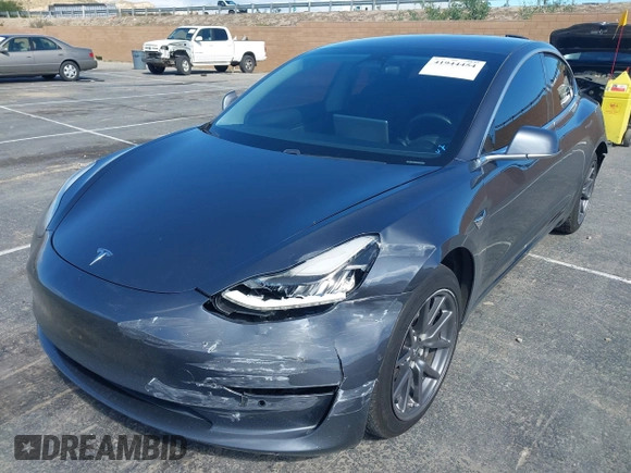 2019 Tesla Model 3 Mid Range with VIN 5YJ3E1EA6KF307456, listed as a IAAI auction lot 41944454 with 99,059 mi miles and . Bid and sale history available at DreamBid. Image 6.