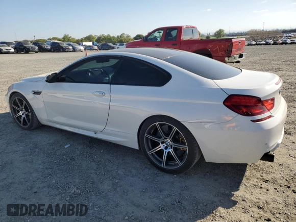 2014 BMW M6 z VIN WBSLX9C51ED160143, wystawiony jako Copart lot #50762185 z przebiegiem 91 718 mil mil oraz Szkody całkowita. Historia ofert i sprzedaży dostępna na DreamBid. Obrazek 2.