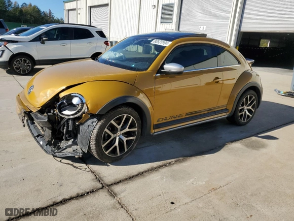 2018 Volkswagen Beetle Dune with VIN 3VWSD7AT2JM709801, listed as a Copart auction lot 80527994 with 0 mi miles and Salvage Title. Bid and sale history available at carsss.com. Image 1.