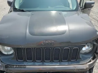 2016 Jeep Renegade Trailhawk with VIN ZACCJBCT5GPC75735, listed as a Copart auction lot 60299005 with 121,990 mi miles and Salvage title. Bid and sale history available at DreamBid. Image 12.