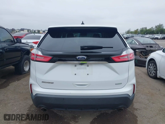 2020 Ford Edge SE z VIN 2FMPK3G92LBB16765, wystawiony jako IAAI lot #42413763 z przebiegiem 99 058 mil mil oraz . Historia ofert i sprzedaży dostępna na DreamBid. Obrazek 16.