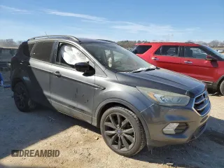 2017 Ford Escape SE with VIN 1FMCU0GD8HUA89018, listed as a Copart auction lot 45302875 with 101,182 mi miles and Salvage Title. Bid and sale history available at carsss.com. Image 4.