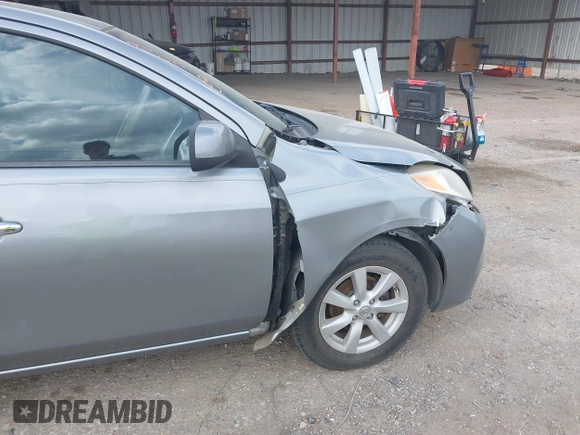 2013 Nissan Versa SV with VIN 3N1CN7AP2DL822216, listed as a IAAI auction lot 41667978 with 194,281 mi miles and . Bid and sale history available at DreamBid. Image 13.