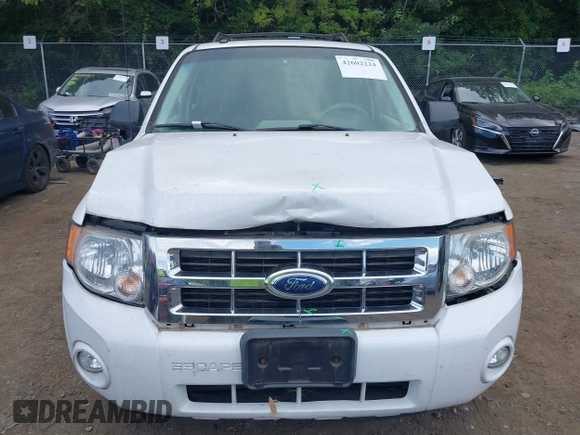 2008 Ford Escape XLT z VIN 1FMCU03108KC68967, wystawiony jako IAAI lot #42602224 z przebiegiem 105 580 mil mil oraz . Historia ofert i sprzedaży dostępna na DreamBid. Obrazek 11.