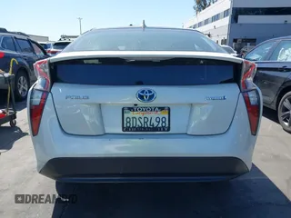 2018 Toyota Prius Two with VIN JTDKBRFU7J3063887, listed as a IAAI auction lot 41938978 with 220,771 mi miles. Bid and sale history available at carsss.com. Image 16.
