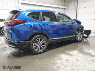 2021 Honda CR-V Touring with VIN 7FARW2H95ME000026, listed as a IAAI auction lot 41550612 with 22,037 mi miles. Bid and sale history available at carsss.com. Image 4.