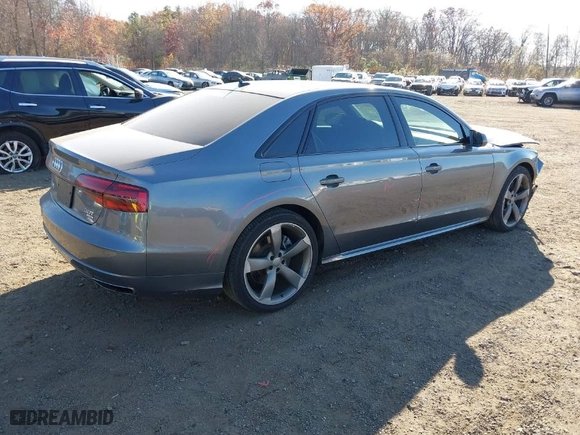 2018 Audi A8 L with VIN WAU44AFD5JN000471, listed as a IAAI auction lot 40785370 with 72,088 mi miles. Bid and sale history available at carsss.com. Image 4.