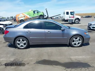 2008 Acura RL Technology z VIN JH4KB16688C004035, wystawiony jako IAAI lot #42247296 z przebiegiem 182 548 mil mil oraz . Historia ofert i sprzedaży dostępna na DreamBid. Obrazek 13.