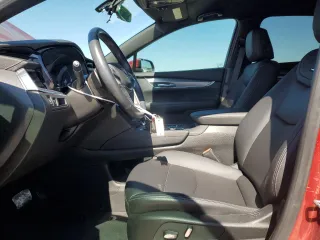 2023 Cadillac XT5 FWD Luxury z VIN 1GYKNAR45PZ191436, wystawiony jako Copart lot #45653615 z przebiegiem 15 044 mil mil oraz Szkoda całkowita • Salvage title. Historia ofert i sprzedaży dostępna na DreamBid. Obrazek 7.