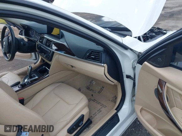 2013 BMW 3 Series 335i xDrive with VIN WBA3B9C59DJ899358, listed as a IAAI auction lot 42321863 with 127,700 mi miles and . Bid and sale history available at DreamBid. Image 5.