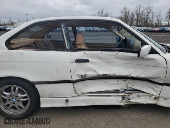 1997 BMW 3 Series 328is with VIN WBABG132XVET04869, listed as a Copart auction lot 45774015 with 123,280 mi miles and Salvage Title. Bid and sale history available at carsss.com. Image 10.