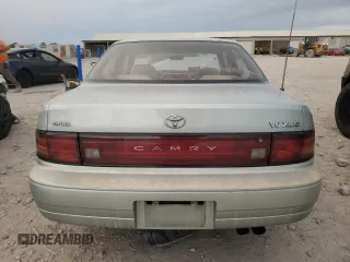1994 Toyota Camry XLE with VIN JT2GK13E0R0039215, listed as a Copart auction lot 79532404 with 109,104 mi miles and Salvage Title. Bid and sale history available at carsss.com. Image 6.