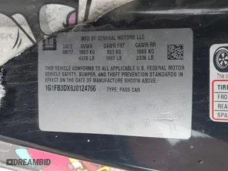 2018 Chevrolet Camaro 1LT with VIN 1G1FB3DX8J0124766, listed as a IAAI auction lot 41737430 with 101,028 mi miles. Bid and sale history available at carsss.com. Image 9.