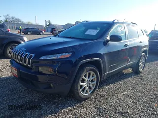 2015 Jeep Cherokee Latitude with VIN 1C4PJMCB1FW709560, listed as a IAAI auction lot 42035619 with 162,354 mi miles. Bid and sale history available at carsss.com. Image 17.