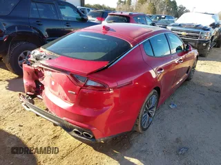 2019 Kia Stinger with VIN KNAE15LA2K6046124, listed as a IAAI auction lot 41348793 with 58,162 mi miles. Bid and sale history available at carsss.com. Image 4.