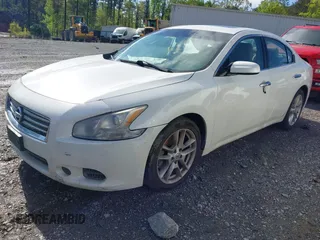 2012 Nissan Maxima S with VIN 1N4AA5AP8CC854088, listed as a IAAI auction lot 42022586 with 159,918 mi miles and . Bid and sale history available at DreamBid. Image 2.