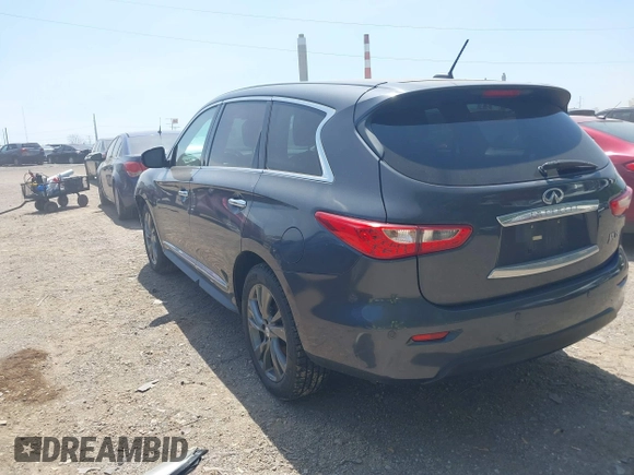 2013 Infiniti JX35 with VIN 5N1AL0MM1DC306701, listed as a IAAI auction lot 42131992 with 177,357 mi miles. Bid and sale history available at carsss.com. Image 3.