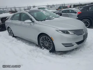 2014 Lincoln MKZ with VIN 3LN6L2JK9ER813109, listed as a IAAI auction lot 41444866 with 128,613 mi miles. Bid and sale history available at carsss.com. Image 1.