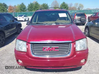 2002 GMC Envoy SLT with VIN 1GKDS13S922205147, listed as a IAAI auction lot 42041118 with 127,400 mi miles. Bid and sale history available at carsss.com. Image 6.