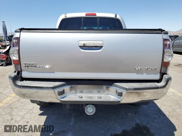 2013 Toyota Tacoma with VIN 3TMLU4EN5DM116911, listed as a Copart auction lot 58420565 with 117,234 mi miles and Salvage title. Bid and sale history available at DreamBid. Image 6.