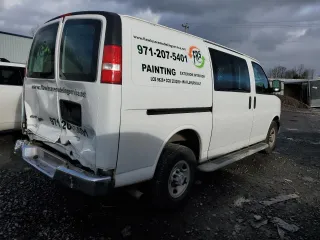 2018 Chevrolet Express Cargo Van with VIN 1GCWGAFG6J1904057, listed as a Copart auction lot 85921774 with 72,676 mi miles and Salvage Title. Bid and sale history available at carsss.com. Image 3.