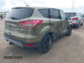 2013 Ford Escape SE with VIN 1FMCU0G90DUA41793, listed as a IAAI auction lot 41842981 with 179,312 mi miles. Bid and sale history available at carsss.com. Image 4.
